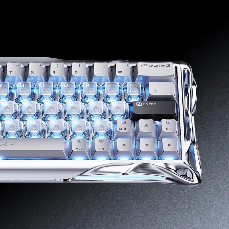 Close-up of GravaStar V60 Pro Chrome Silver keycaps with blue backlighting